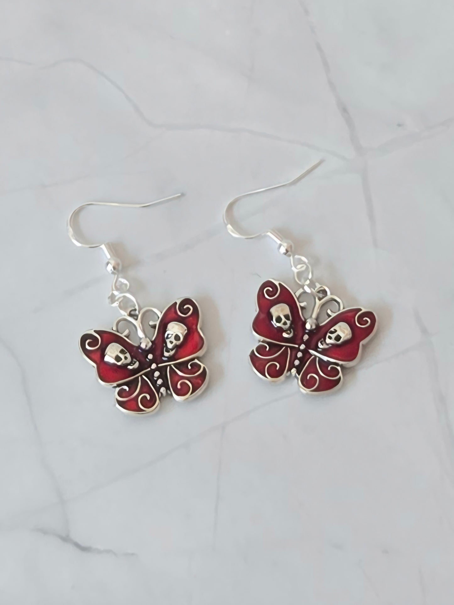 Skull butterfly earrings