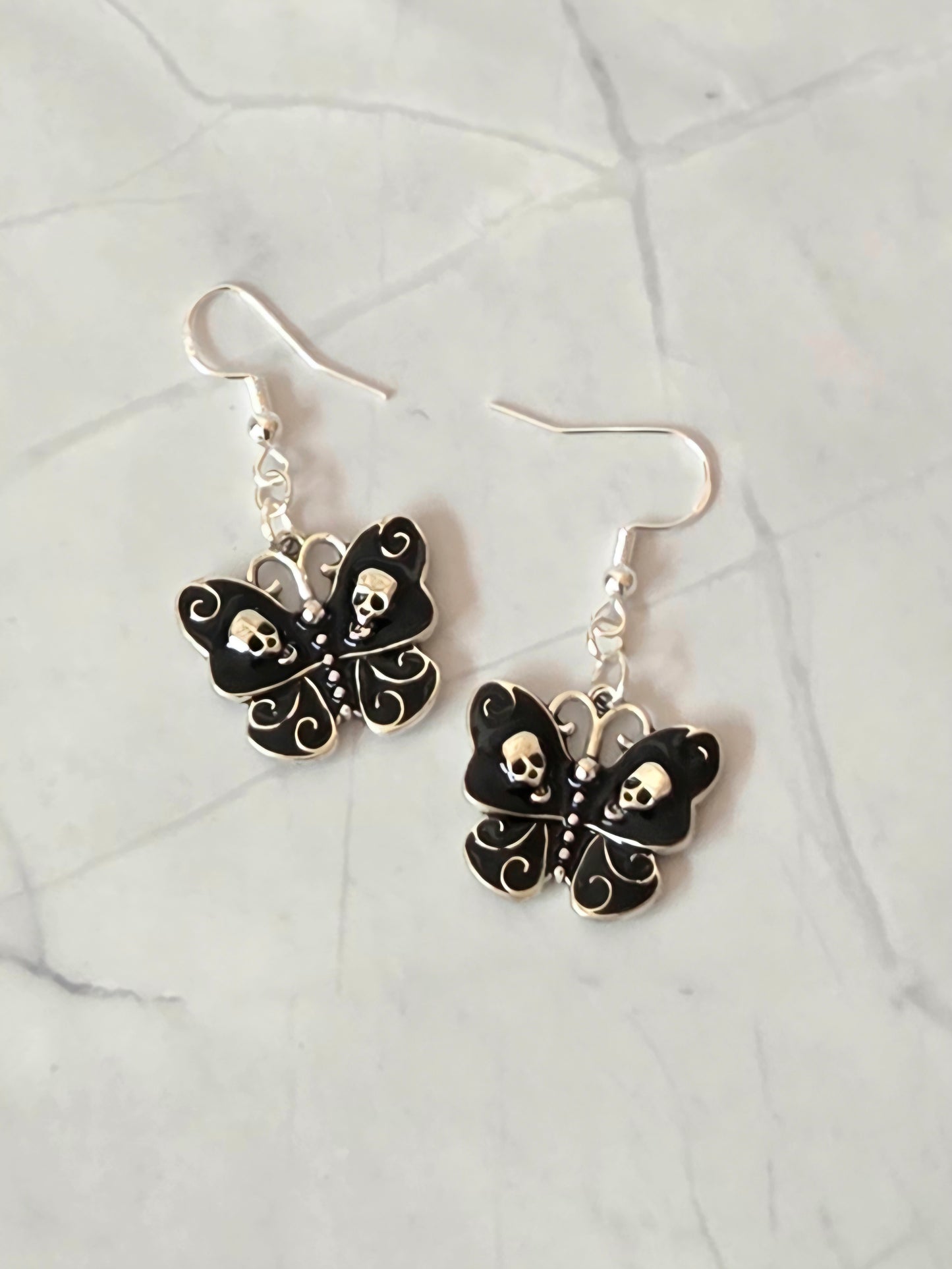 Skull butterfly earrings