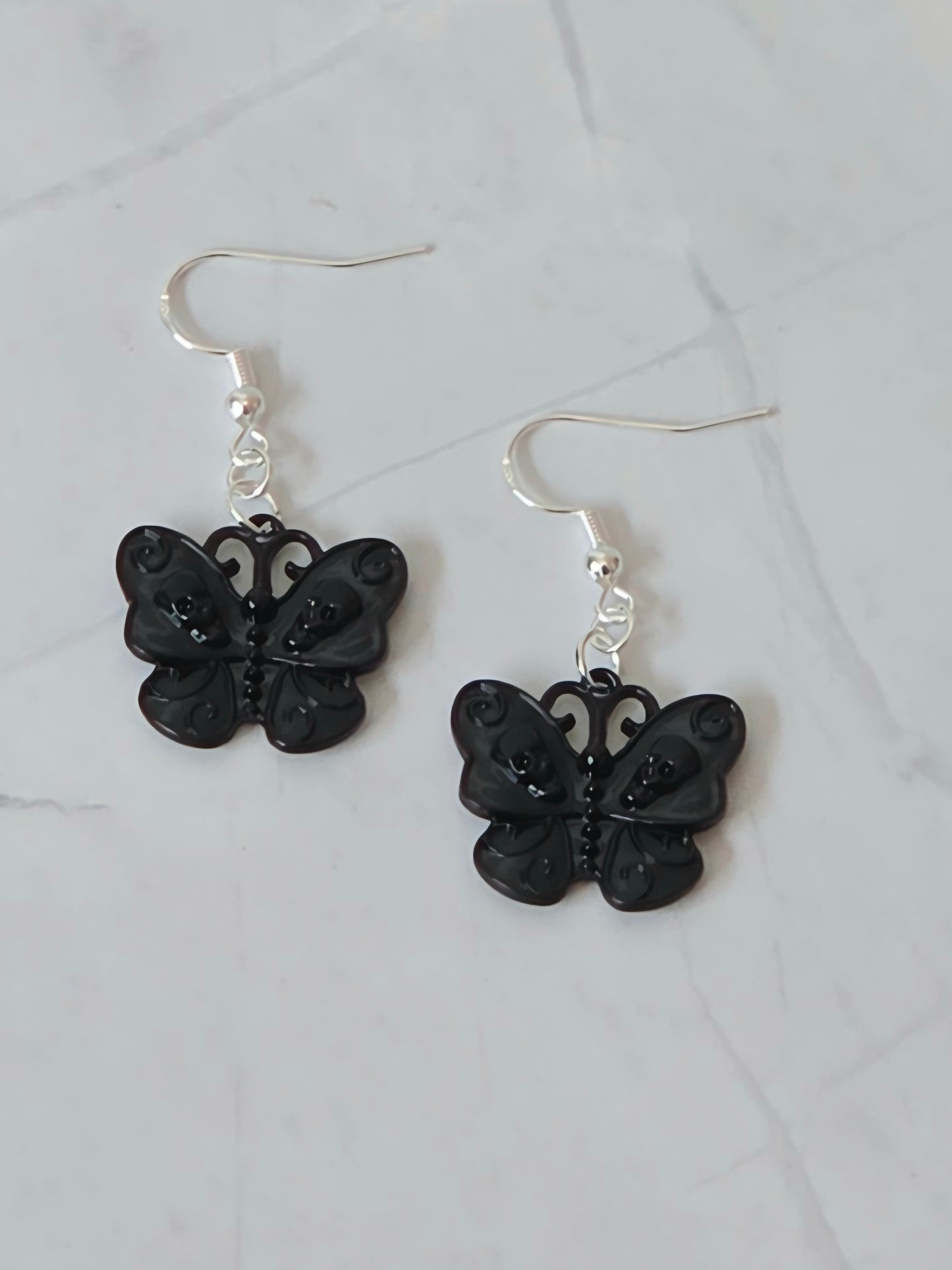 Skull butterfly earrings
